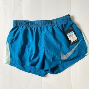 NIKE TRACK SHORT . NEW! built in underwear.